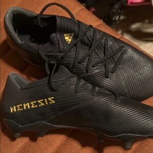 Adidas Black and Gold Athletic Shoes with Ribbed Upper
